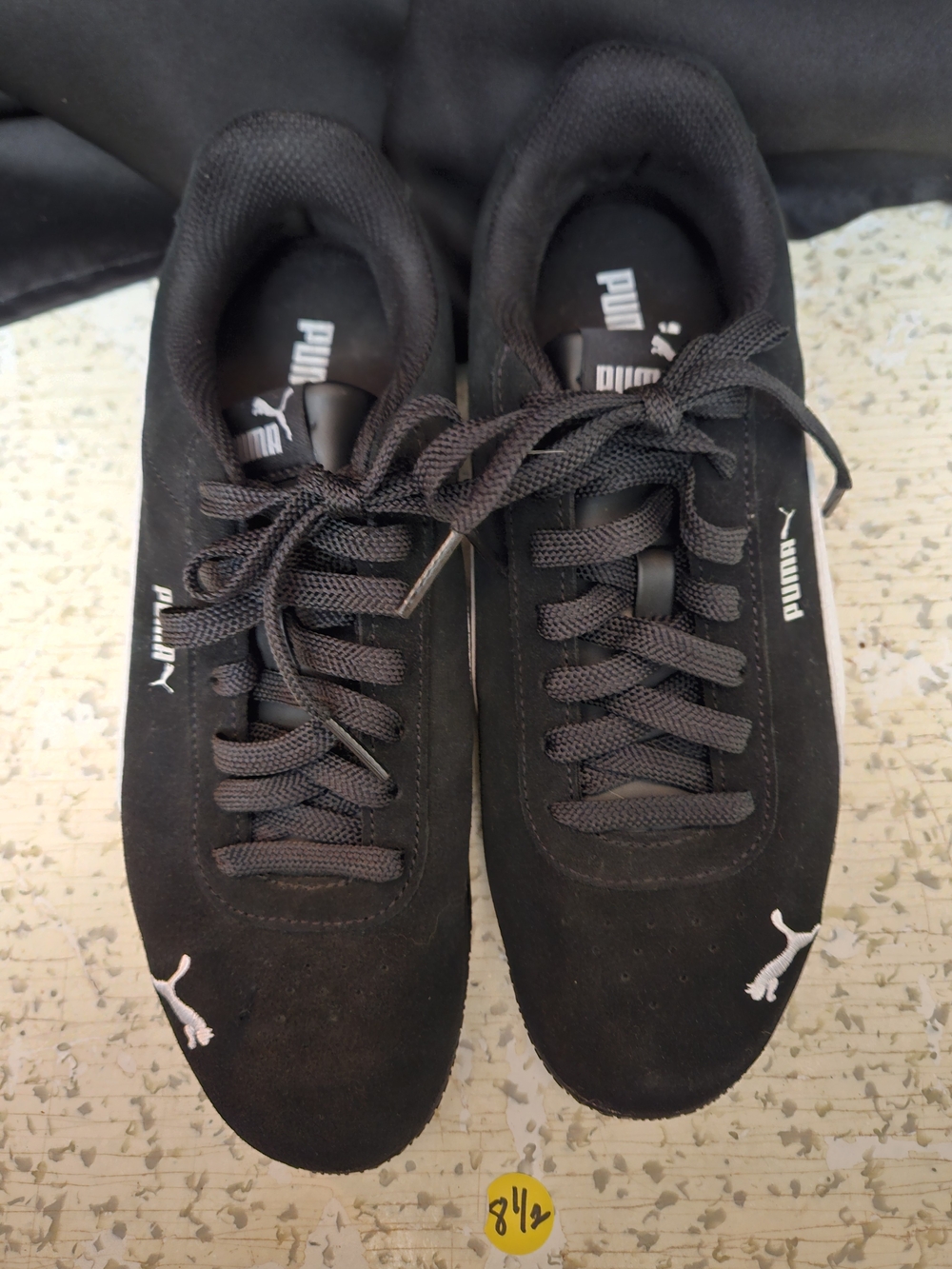 Puma Women's Bella Donna SD leatherback sneakers with white logo.